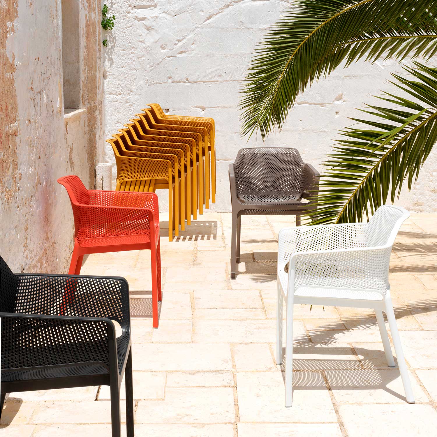 NET - Designer outdoor chair with armrests