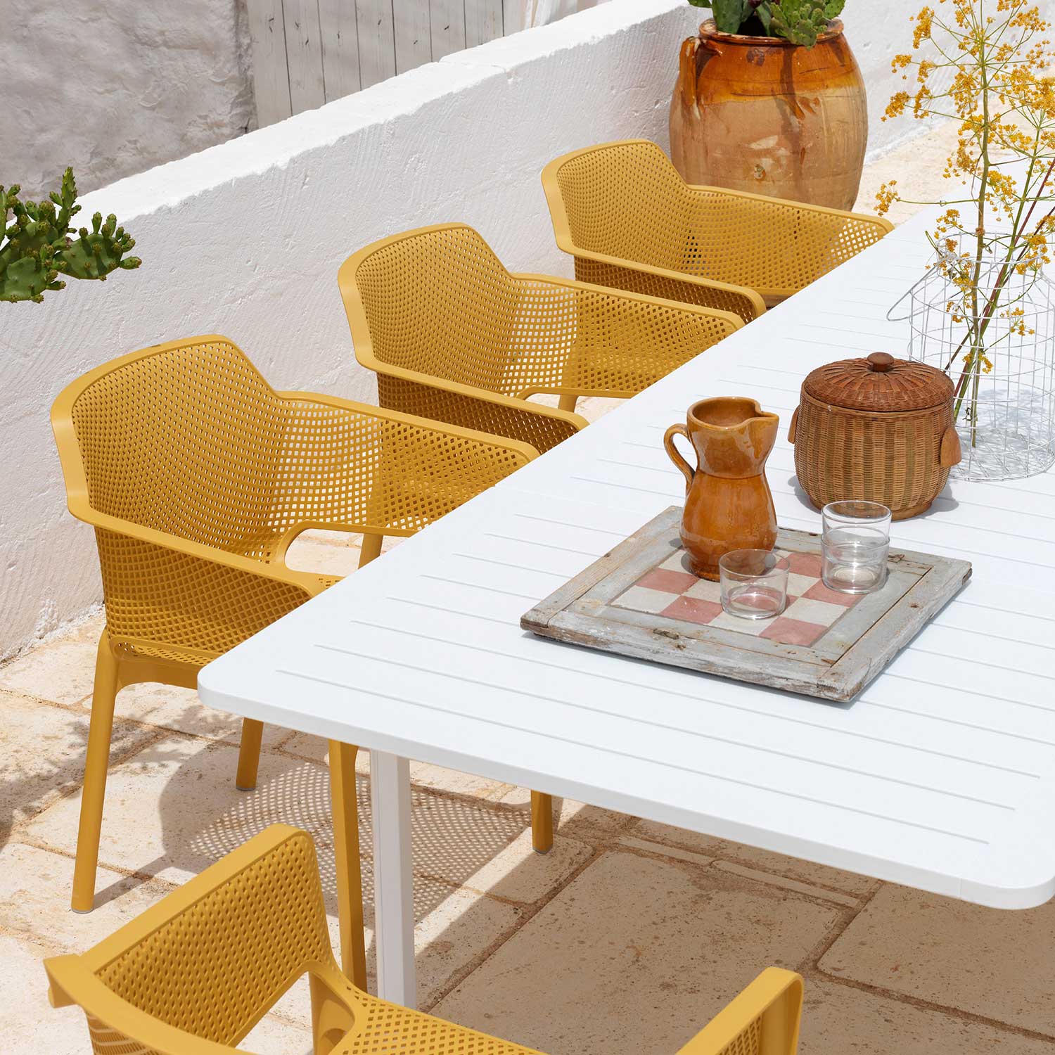 NET - Designer outdoor chair with armrests