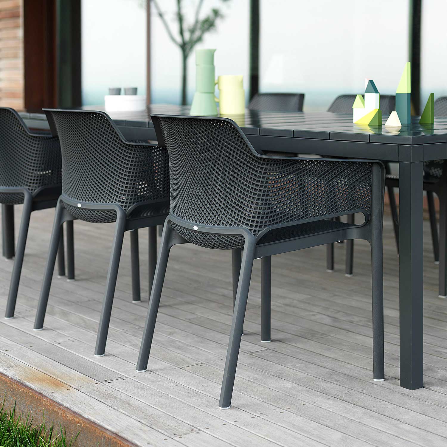 NET - Designer outdoor chair with armrests