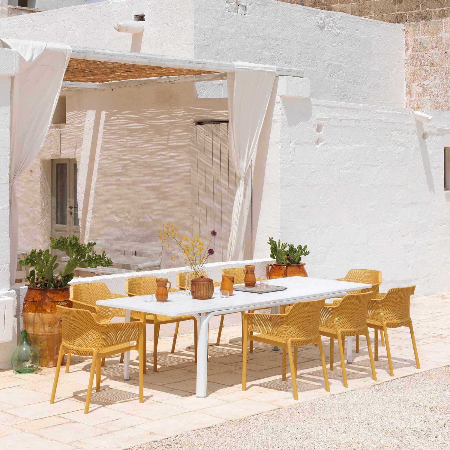 NET - Designer outdoor chair with armrests